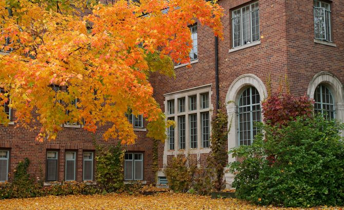 Fall,College,Campus.,University,Student,Dorm,With,Autumn,Leaves.,Horizontal Fall College Campus. University student dorm with autumn leaves. Horizontal format.